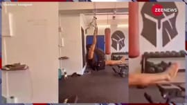 farhan akhtar with shibani dandekar perfoming stunt while doing workout see video farhan akhtar with shibani dandekar perfoming stunt while doing workout see video