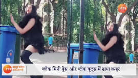 Adah Sharma walking on the street with garbage bag Looking amazing black dress long boots snmp Adah Sharma walking on the street with garbage bag Looking amazing black dress long boots snmp